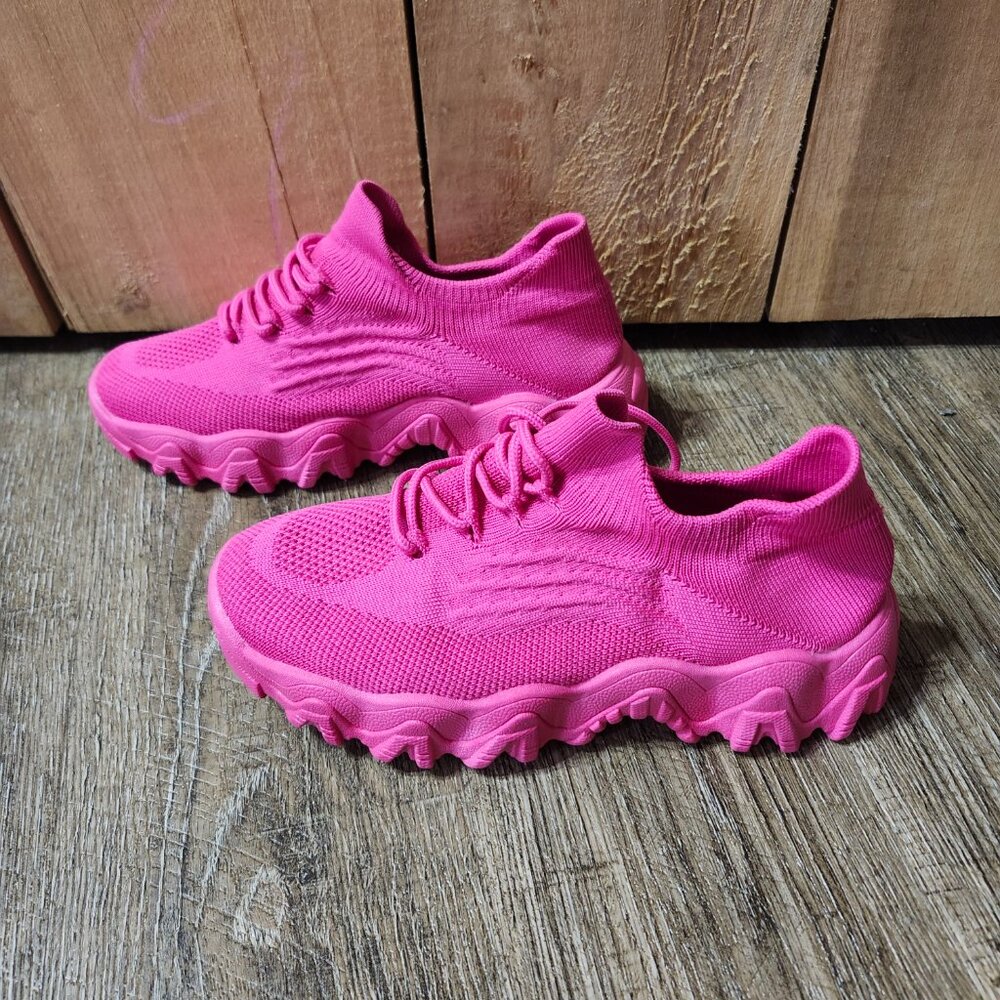 womans pink sneakers size 39 EU  (8-8.5 inches in US) Run small.